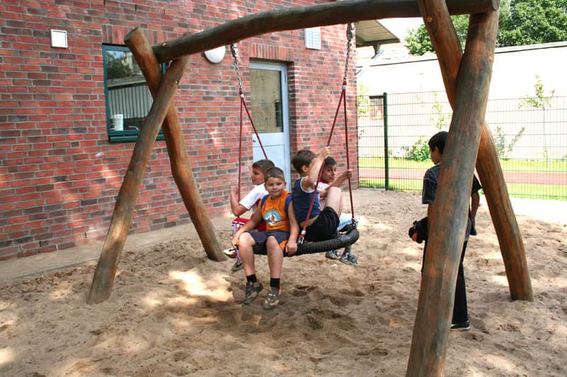 Children swinging